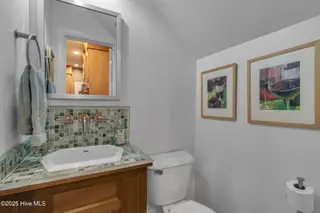2811 Deerfield Lane N, Wilson, NC 27896 — 5-bedroom home in Deerfield, Wilson, NC, photo 15 of 42: Half Bath Down