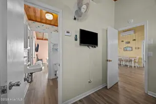 1011 W Beach Drive, Oak Island, NC 28465 – photo 22: 39-web-or-mls-IMG_2428