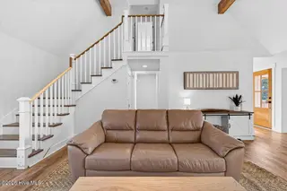 501 Shoreline Drive E, Sunset Beach, NC 28468 – photo 12: Bright tall ceilings and beams