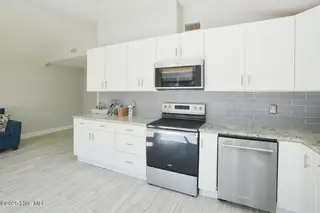 127 NW 10th Street, Oak Island, NC 28465 – photo 7: 127 NW 10th St Oak Island NC-large-010-0