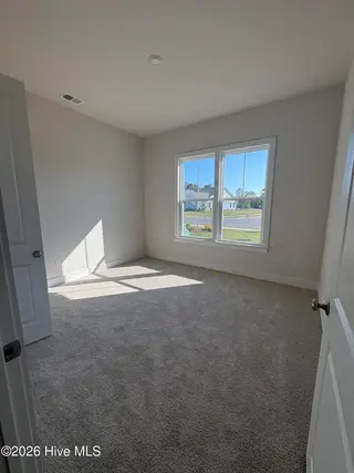 2067 Rosin Drive 20, Southport, NC 28461 – photo 21: Front Secondary Bedroom