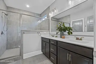 6942 Campbells Ridge Drive SE, Leland, NC 28451 – photo 19: 28_bathroom