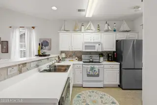 1008 Great Egret Circle SW D, Sunset Beach, NC 28468 — 2-bedroom condo in Sandpiper Bay, Sunset Beach, NC, photo 5 of 34: 11-web-or-mls-CamMediallc.com (17 of 28)
