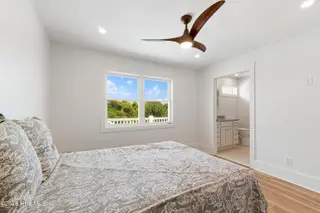 413 Club Colony Drive, Atlantic Beach, NC 28512 – photo 13: Primary suite