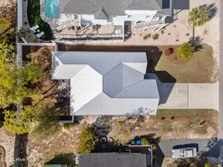 129 NW 11th Street, Oak Island, NC 28465 – photo 4: metal roof