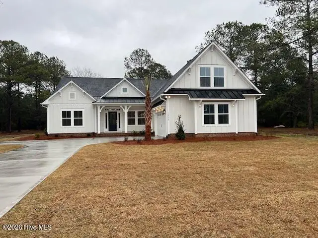 7564 Haddington Place SW 13, Sunset Beach, NC 28468 – photo 1 of 16: Gasbury Pic