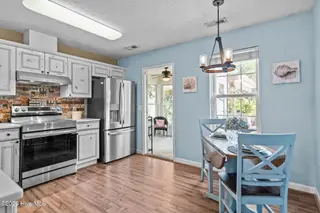 213 NE 48th Street, Oak Island, NC 28465 – photo 9: 30-web-or-mls-Photo Aug 21 2025, 10 58 2