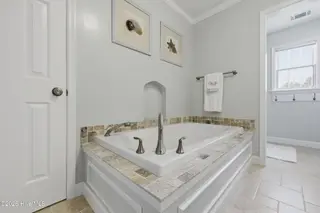 215 Bayshore Drive, Elizabeth City, NC 27909 — 3-bedroom home in Brickhouse Point, Elizabeth City, NC, photo 21 of 68: Primary Bathroom