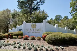 706 Oyster Bay Drive, Sunset Beach, NC 28468 – photo 17: SEA TRAIL SIGN