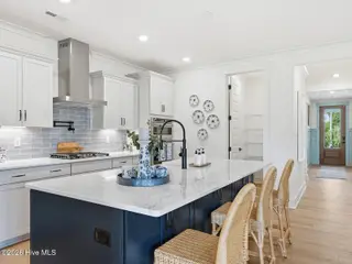 9251 Salty Breeze Place, Leland, NC 28451 — 5-bedroom home in Grand Park, Leland, NC, photo 14 of 42: Kitchen