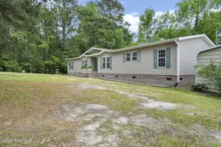 552 Colonial Landing Road SE, Bolivia, NC 28422 – photo 6: 6-web-or-mls-Front ext angle