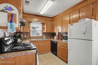 419 1st Street, Sunset Beach, NC 28468 – photo 10: 010_file_3209