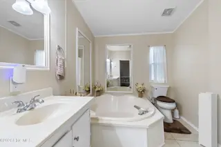 1109 Nautical Lane SW, Calabash, NC 28467 — 4-bedroom manufactured home in Village At Calabash, Calabash, NC, photo 21 of 34: Master bathroom
