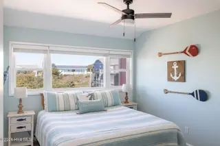 1509 Ocean Drive West, Emerald Isle, NC 28594 — 4-bedroom townhome in Emerald Isle By The Sea, Emerald Isle, NC, photo 12 of 26: 2 Seas the Day West 023 2nd level king w