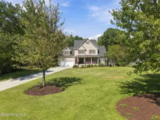 306 Osprey Point Drive, Sneads Ferry, NC 28460 — 4-bedroom home in Creeks Edge, Sneads Ferry, NC, photo 4 of 53: 8-web-or-mls-DJI_20260929124545_0288_D