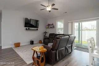 610 Bright Harvest Drive, Maysville, NC 28555 – photo 10: Living Room with slider