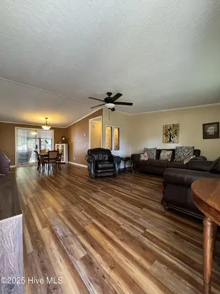 211 Beachwood Drive NW, Calabash, NC 28467 — 3-bedroom manufactured home in Ocean Forest, Calabash, NC, photo 16 of 75: living room 1