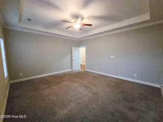 412 Moss Springs Drive, Peletier, NC 28584 – photo 12: primary bedroom