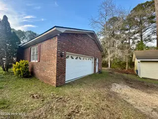 691 Harris Creek Road, Jacksonville, NC 28540 — 3-bedroom home, Jacksonville, NC, photo 11 of 41: attached garage(s)