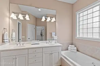 4239 Ashfield Place, Southport, NC 28461 – photo 20: His and Hers Sinks | Soaking Tub