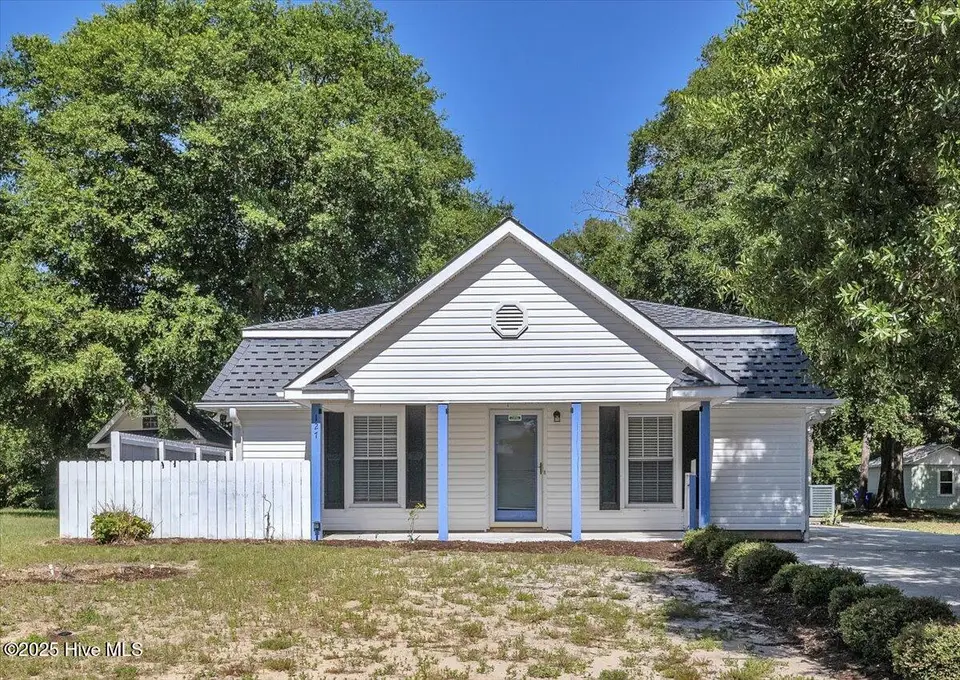 127 NW 19th Street, Oak Island, NC 28465 – photo 1 of 56: 127 NW 19th St