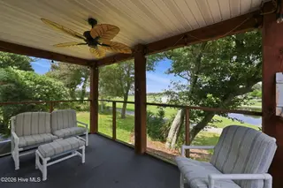 109 Oakleaf Drive, Pine Knoll Shores, NC 28512 – photo 24: Screened porch