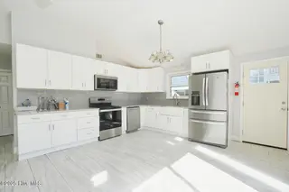 127 NW 10th Street, Oak Island, NC 28465 – photo 4: 127 NW 10th St Oak Island NC-large-007-0