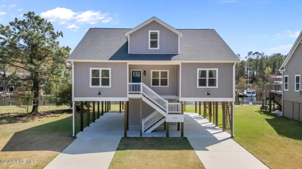 5706 Gondolier Drive, New Bern, NC 28560 – photo 1 of 71: 1-web-or-mls-DJI_20260325135628_0010_D