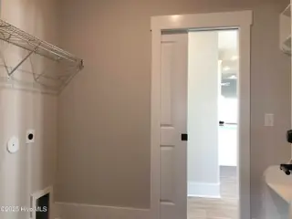 2289 Crescent Bay Drive, Southport, NC 28461 – photo 15: Laundry Room