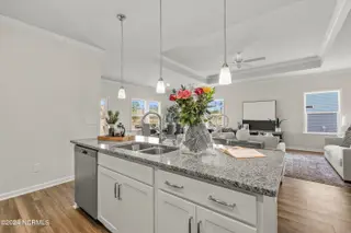 245 Mayflower Drive NW Lot 36, Calabash, NC 28467 – photo 6: Kitchen Island - Gwinett C - Allston Par
