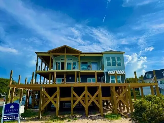 102 Ocean Drive, Oak Island, NC 28465 – photo 1 of 9: thumbnail_IMG_9382