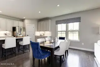 1430 Whistling Straits Way, Sunset Beach, NC 28468 – photo 7: Kitchen Din Rm
