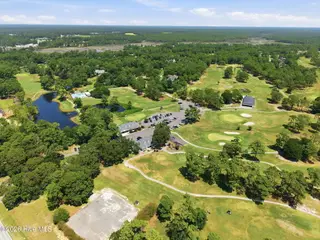 110 Sutton Drive, Cape Carteret, NC 28584 – photo 24: Aerial Golf club and fairways
