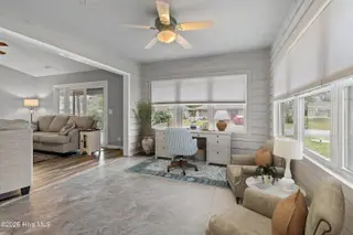 606 Camellia Lane, Sunset Beach, NC 28468 – photo 22: Sunroom virt staging