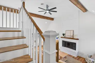 501 Shoreline Drive E, Sunset Beach, NC 28468 – photo 22: Stairs to bedroom and bathroom upstairs