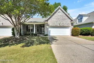 1009 N Sanderling Drive, Leland, NC 28451 — 3-bedroom townhome in Waterford of the Carolinas, Leland, NC, photo 1 of 63: Front