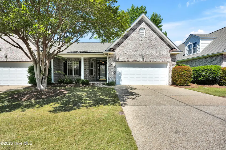 1009 N Sanderling Drive, Leland, NC 28451 — 3-bedroom townhome in Waterford of the Carolinas, Leland, NC, photo 1 of 63: Front