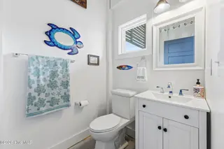 1207 S Topsail Drive, Surf City, NC 28445 – photo 12: 106-web-or-mls-_RAD6566