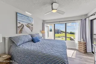 8801 Reed Drive 115, Emerald Isle, NC 28594 – photo 12: Primary Bedroom w/ Water Views