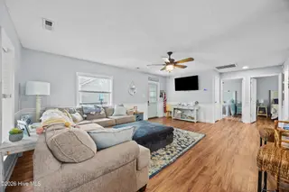 159 NW 4th Street, Oak Island, NC 28465 – photo 12: 12_living room