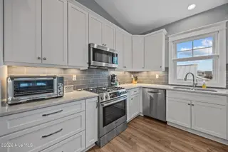 116 W Dolphin Drive, Oak Island, NC 28465 – photo 16: 39-web-or-mls-IMG_4354