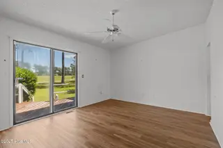 304 Lord Granville Drive, Morehead City, NC 28557 – photo 18: Downstairs Primary Bedroom 1