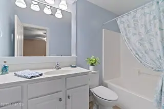 473 Pine Lake Road, Southport, NC 28461 — 4-bedroom home in Boiling Spring Lakes, Southport, NC, photo 18 of 39: Photo 30 master bath AI