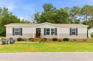 2667 Mill Pond Court SE, Bolivia, NC 28422 — 3-bedroom manufactured home in Cypress Lakes, Bolivia, NC, photo 1 of 36