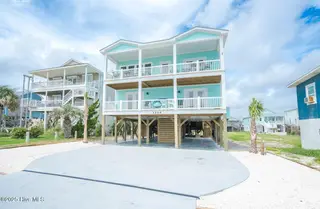 3504 E Beach Drive, Oak Island, NC 28465 – photo 1: Yankee front orig
