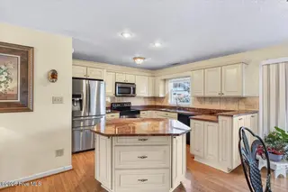 104 NE 34th Street, Oak Island, NC 28465 – photo 17: 18-kahunaphoto