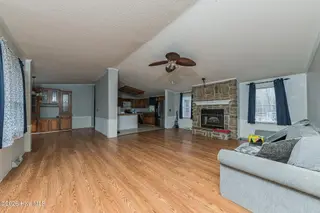 210 Creek Bank Drive, New Bern, NC 28560 — 3-bedroom manufactured home in Creekwater Haven, New Bern, NC, photo 9 of 58: LivingRoom