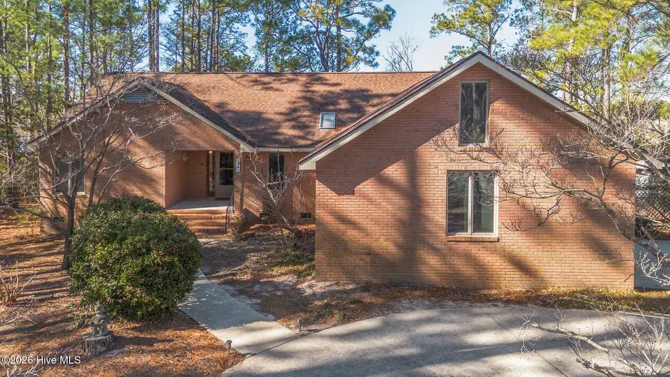 1461 S Shore Drive, Southport, NC 28461 – photo 1 of 75: front of house