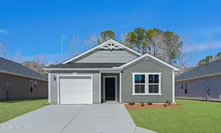 7091 Woodline Drive SW, Sunset Beach, NC 28468 – photo 1: A