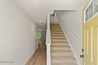 8031 Sterling Oaks Drive NW, Ash, NC 28420 – photo 11: Entry Stair